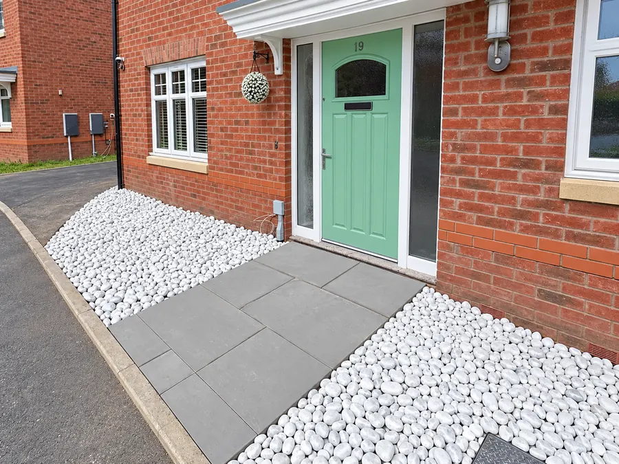 White gravel borders and grey slab entrance path