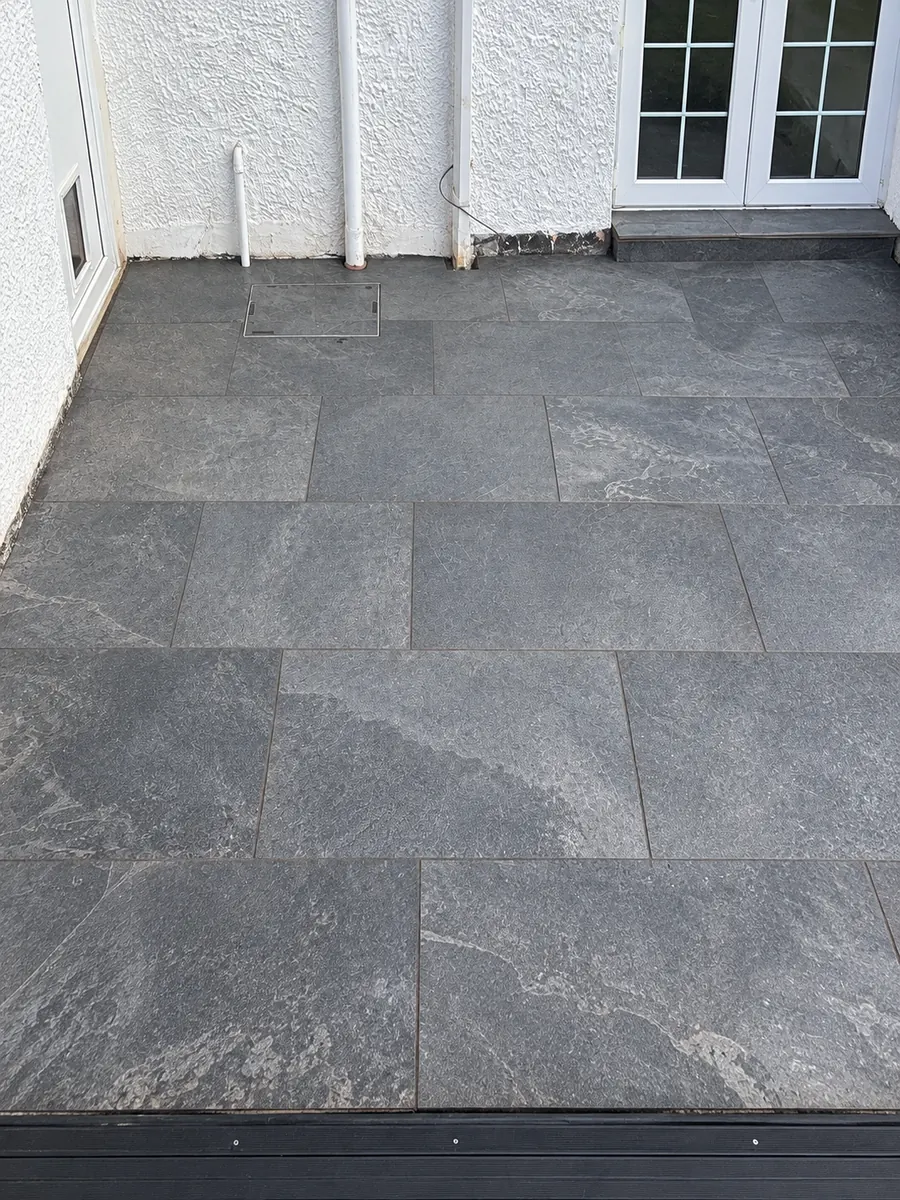 Close view of finished grey slab courtyard